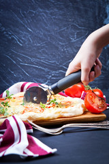 Delicious italian pizza served on wooden table