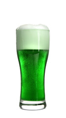Glass of green beer on white background
