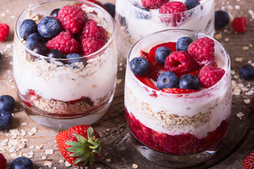 yogurt with oatmeal , blueberries , raspberries and strawberries