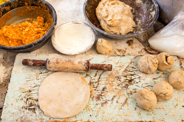 Fototapeta premium Traditional way of making indian parantha on street sell stall in Jaisalmer, India