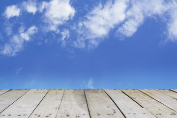 Wood  with blue sky and cloud.