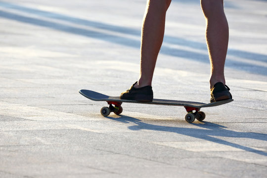 riding a skateboard man closeup