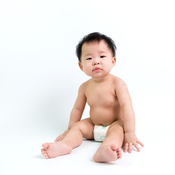 Asian baby sitting up