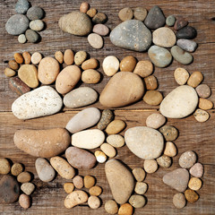 Fototapeta na wymiar Abstract cute pebbles, footprint from boulder