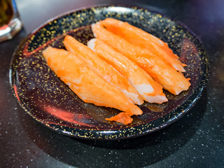 Imitation crab stick on plate, soft focus