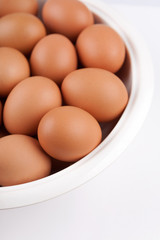 Fresh organic eggs in bowls