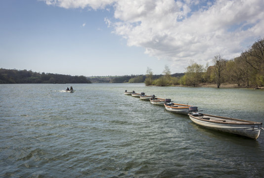 Line of Boats Afloat in a Reservoir, Kent, UK