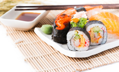 sushi on white dish isolated