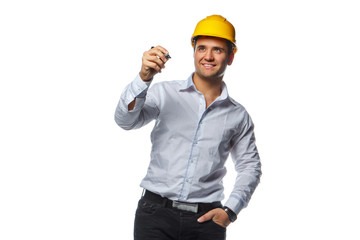 Male in yellow safety helmet holding a pen.