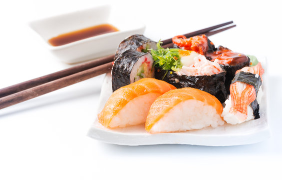 sushi on white dish isolated