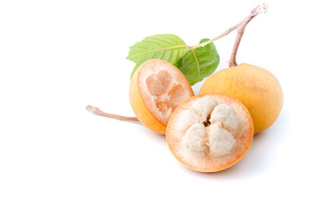 sliced santol fruit isolated