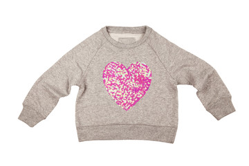 Stylish children's sweater with a big shiny heart on a white background