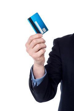 Cropped image of businessman with cash card.