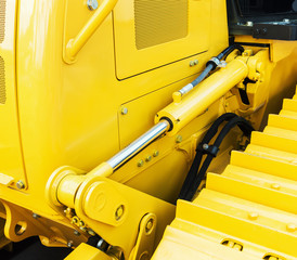 hydraulics tractor yellow