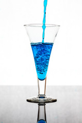 splashing water in glass