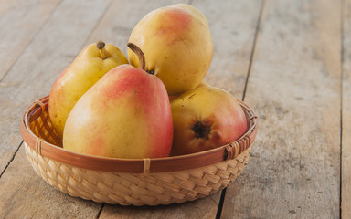 Fruit background. Fresh organic pears on wood. Pear autumn harvest