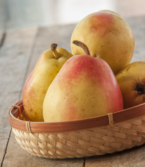Fruit background. Fresh organic pears on wood. Pear autumn harvest
