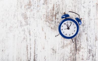 Watches. On a white, wooden background.