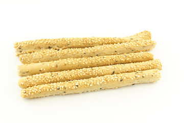 crispy sticks with sesame on white background