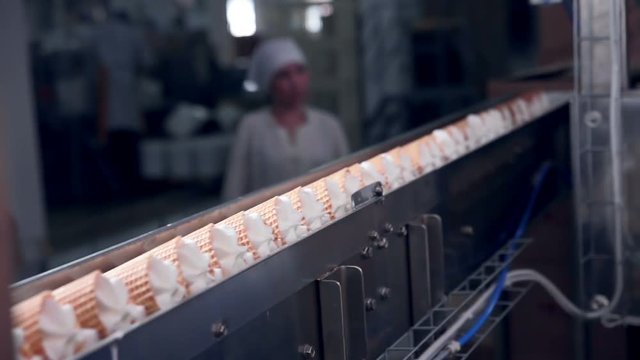 Modern ice cream automatic production line. Automatic equipment at the food factory. 1080p.