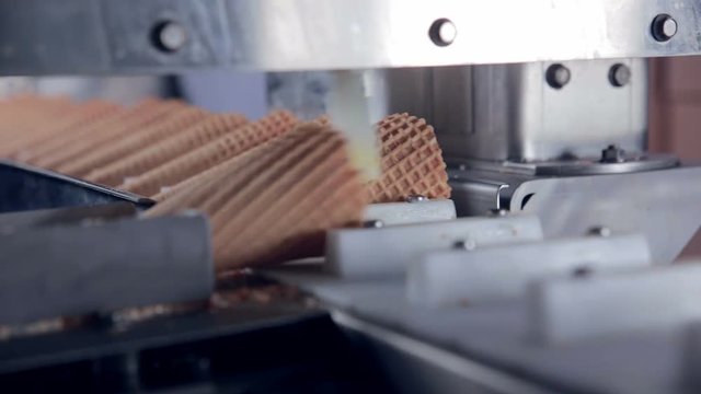Modern ice cream automatic production line. Automatic equipment at the food factory. 1080p.