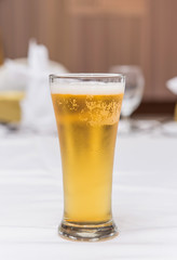 Glass of beer in pub and restaurant