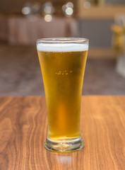 Glass of beer in pub and restaurant