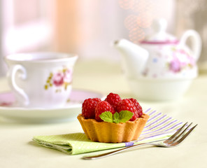 Fruit raspberry tarts on a table