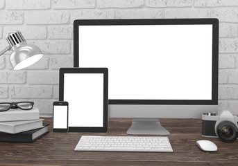 Fototapeta premium Responsive mockup screen. Monitor, tablet, phone on table in office. 3d rendering.