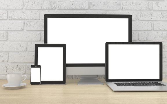 Responsive mockup screen. Monitor, laptop, tablet, phone on table in office. 3d rendering.