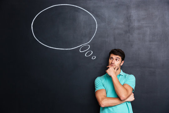 Pensive Attractive Young Man With Thinking Bubble