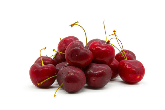 Red cherries on white background.