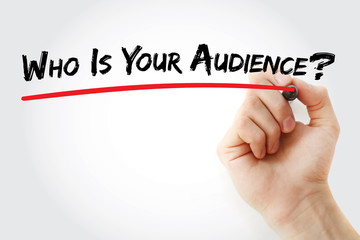 Hand writing Who Is Your Audience? with marker, concept background