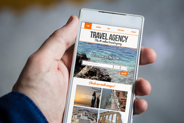 holding travel agency smartphone
