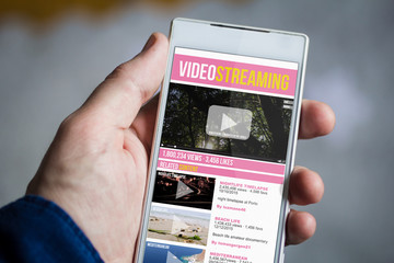holding video streaming smartphone
