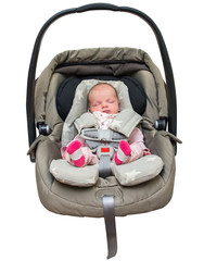 newborn baby girl in a car seat