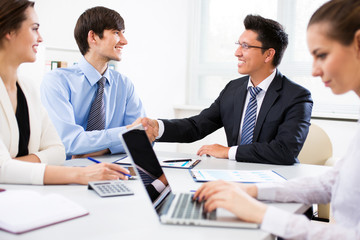 Business people shaking hands