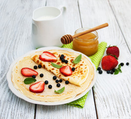 crepes with strawberries and blueberries
