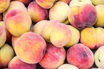 peaches on the counter market as a background