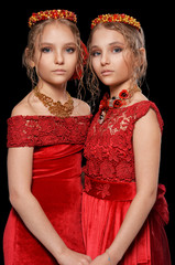 beautiful  little girls in red dresses