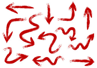 Set of arrows painted rough brush by hand. Tough red strokes. 12 elements isolated on white background. Abstract.