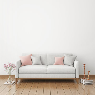 Interior poster mock-up with fabric sofa and pillows on white wall background. 3D rendering.