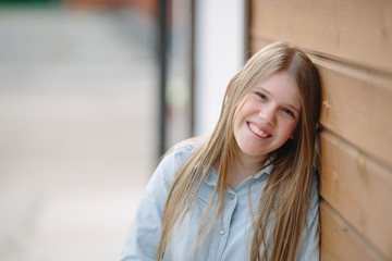 Portrait of young happy smiling girl © barbiturat