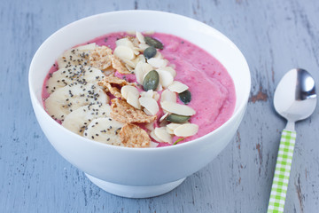 strawberry and raspberry smoothie bowl with banana,almond,cereal