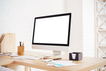 Blank computer monitor on desktop