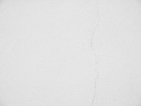 Cracked concrete wall a long way