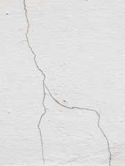 white wall with cracks