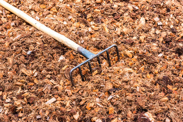 yard of plant soil with fork for forming