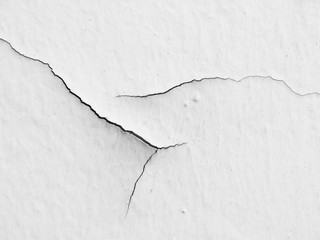 white wall with cracks