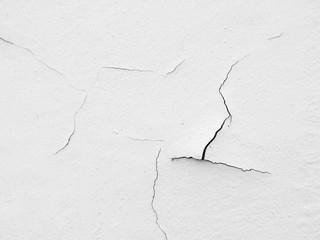 Cracked concrete white wall background